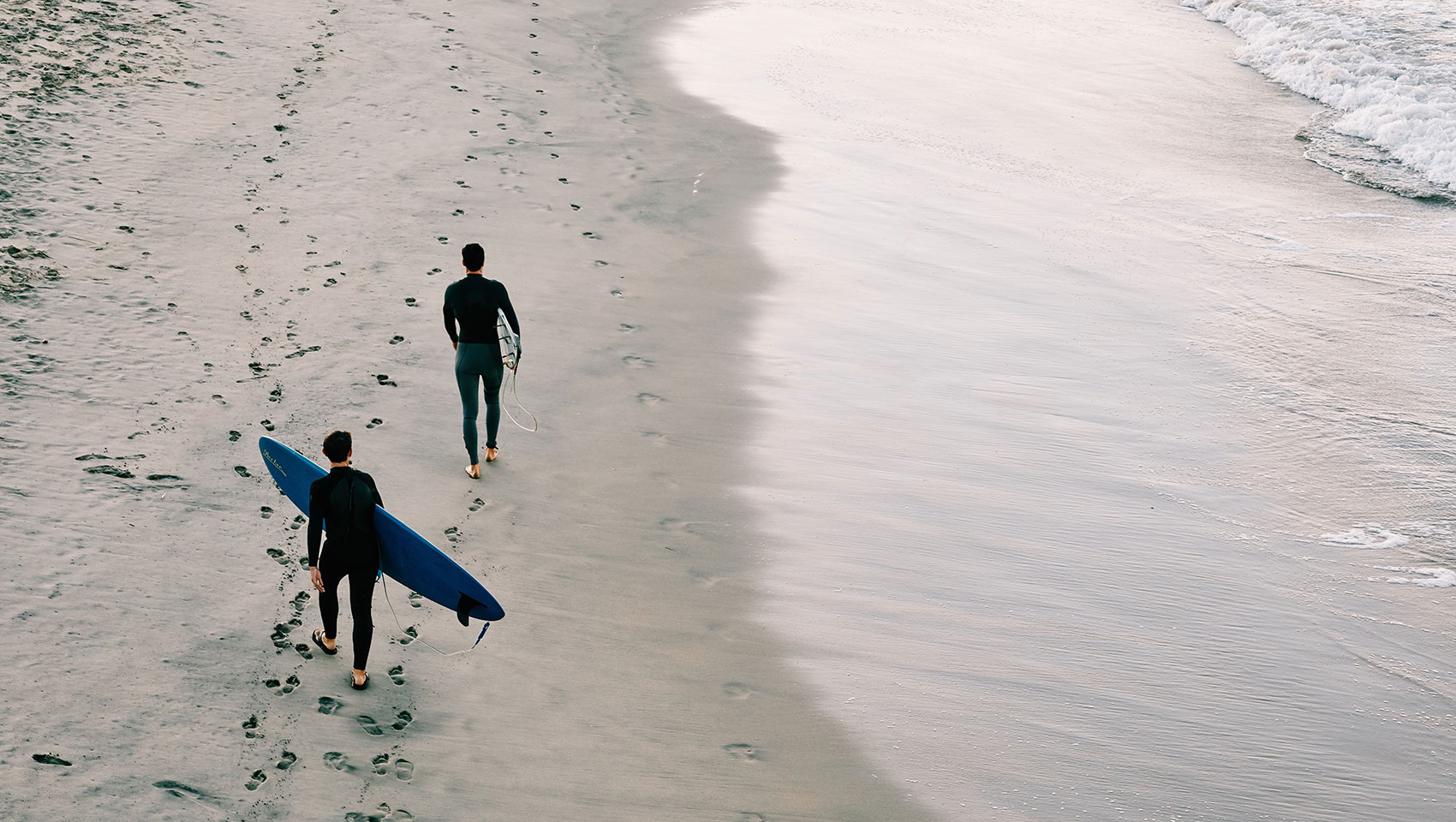 Surfers on the beach