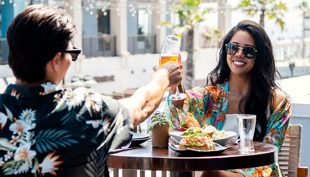 Couple having drinks on the patio