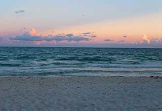 ocean and beach after sunset