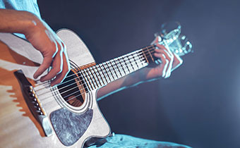 man playing guitar