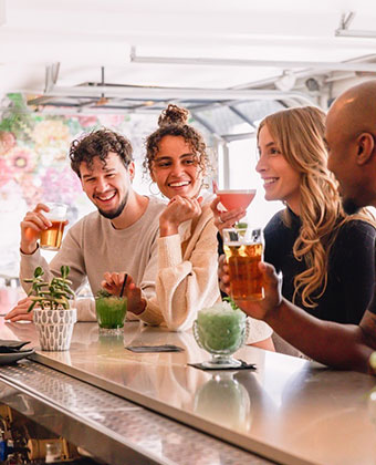 Friends drinking at the bar