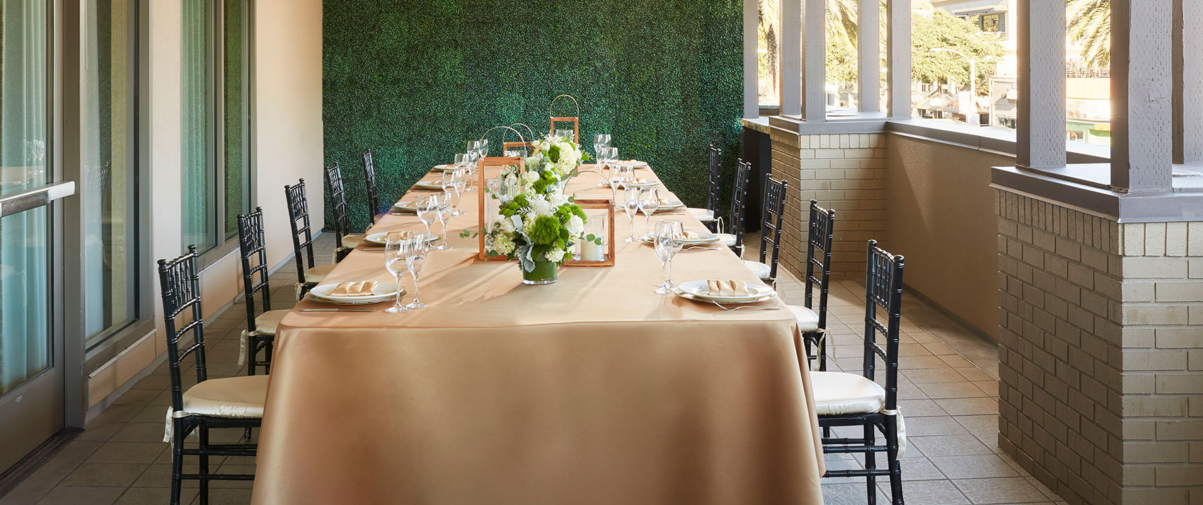 royal table set with pink linen at kimpton shorebreak resort outdoor terrace